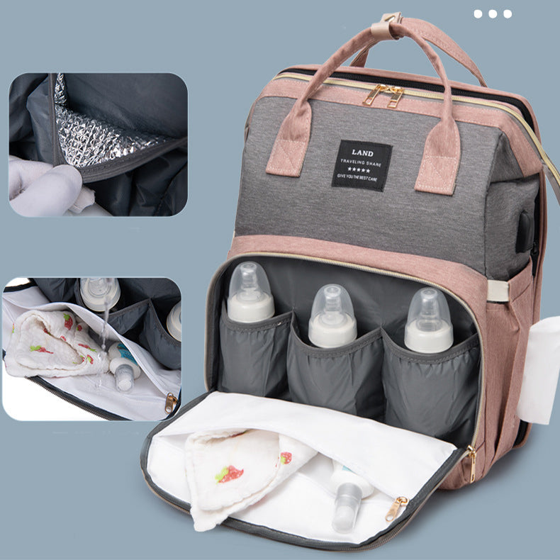 Dream Voyager - Zaino Fasciatoio 2-in-1 con Culla Integrata e Porta USB