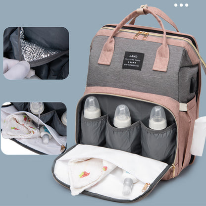 Dream Voyager - Zaino Fasciatoio 2-in-1 con Culla Integrata e Porta USB