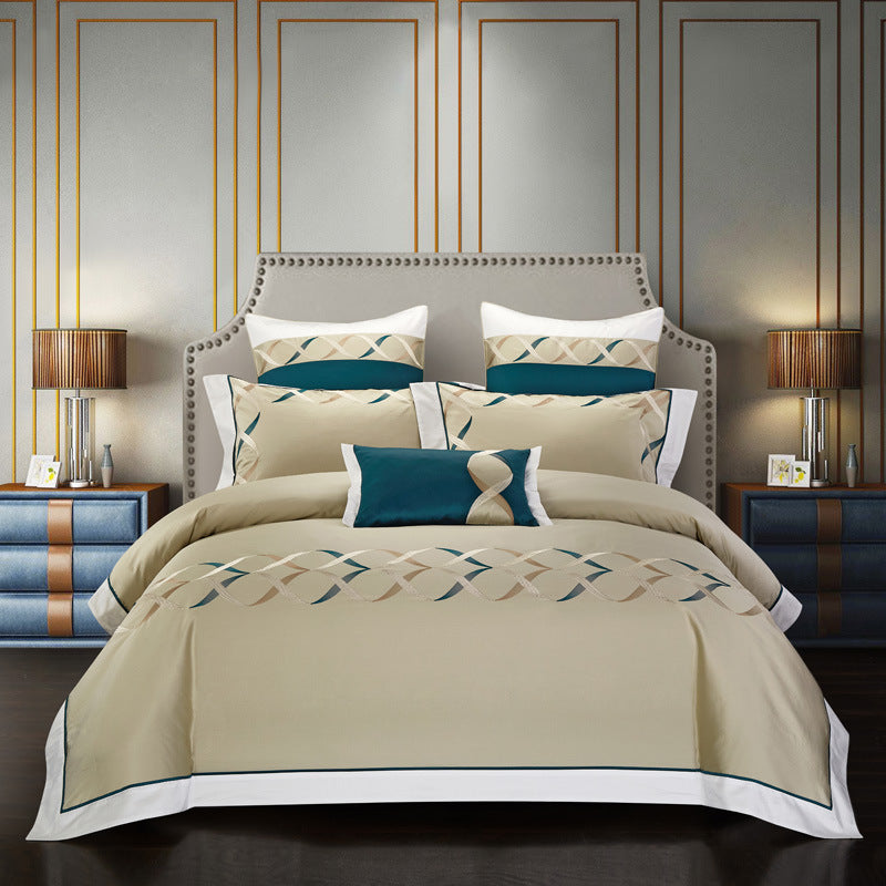 Set 4 Pezzi in Cotone Ricamato Premium