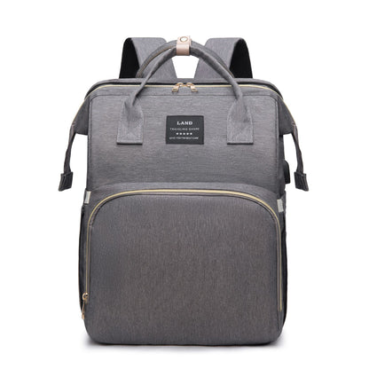 Dream Voyager - Zaino Fasciatoio 2-in-1 con Culla Integrata e Porta USB