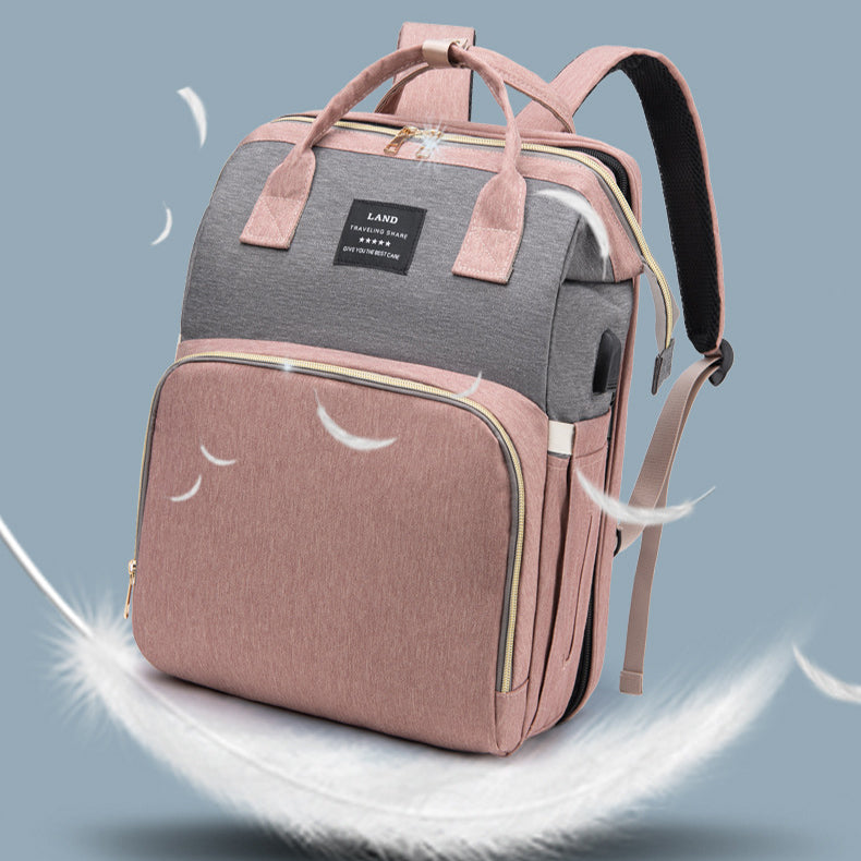 Dream Voyager - Zaino Fasciatoio 2-in-1 con Culla Integrata e Porta USB