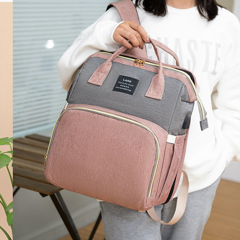 Dream Voyager - Zaino Fasciatoio 2-in-1 con Culla Integrata e Porta USB