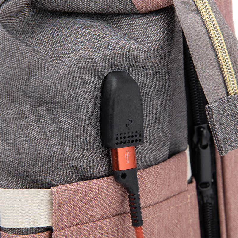 Dream Voyager - Zaino Fasciatoio 2-in-1 con Culla Integrata e Porta USB