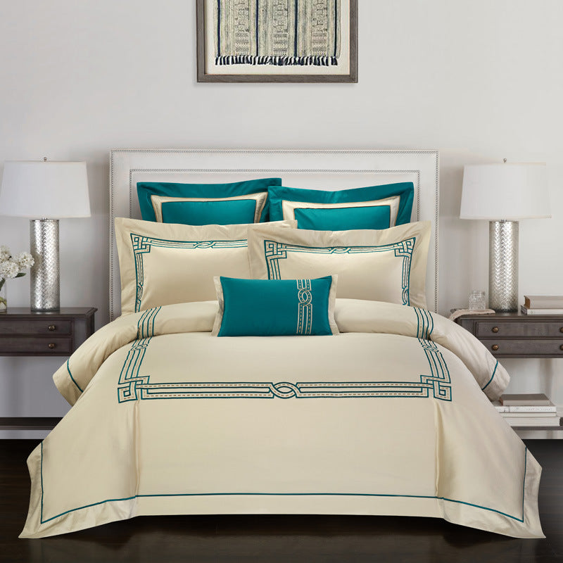 Set 4 Pezzi in Cotone Ricamato Premium